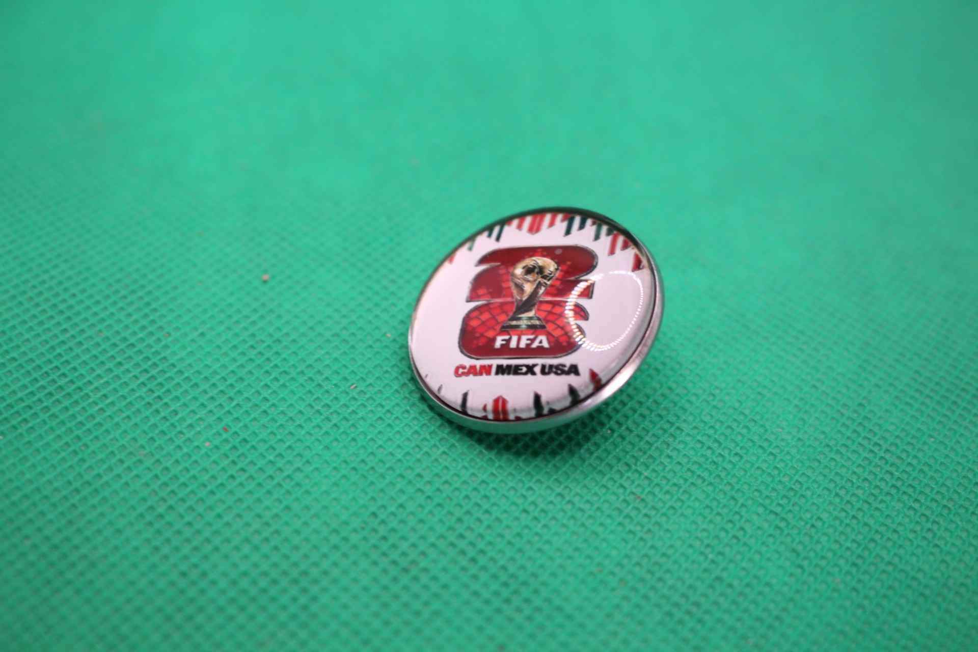 FIFA World Cup 2026 brooch pin, official logo, front image on angle