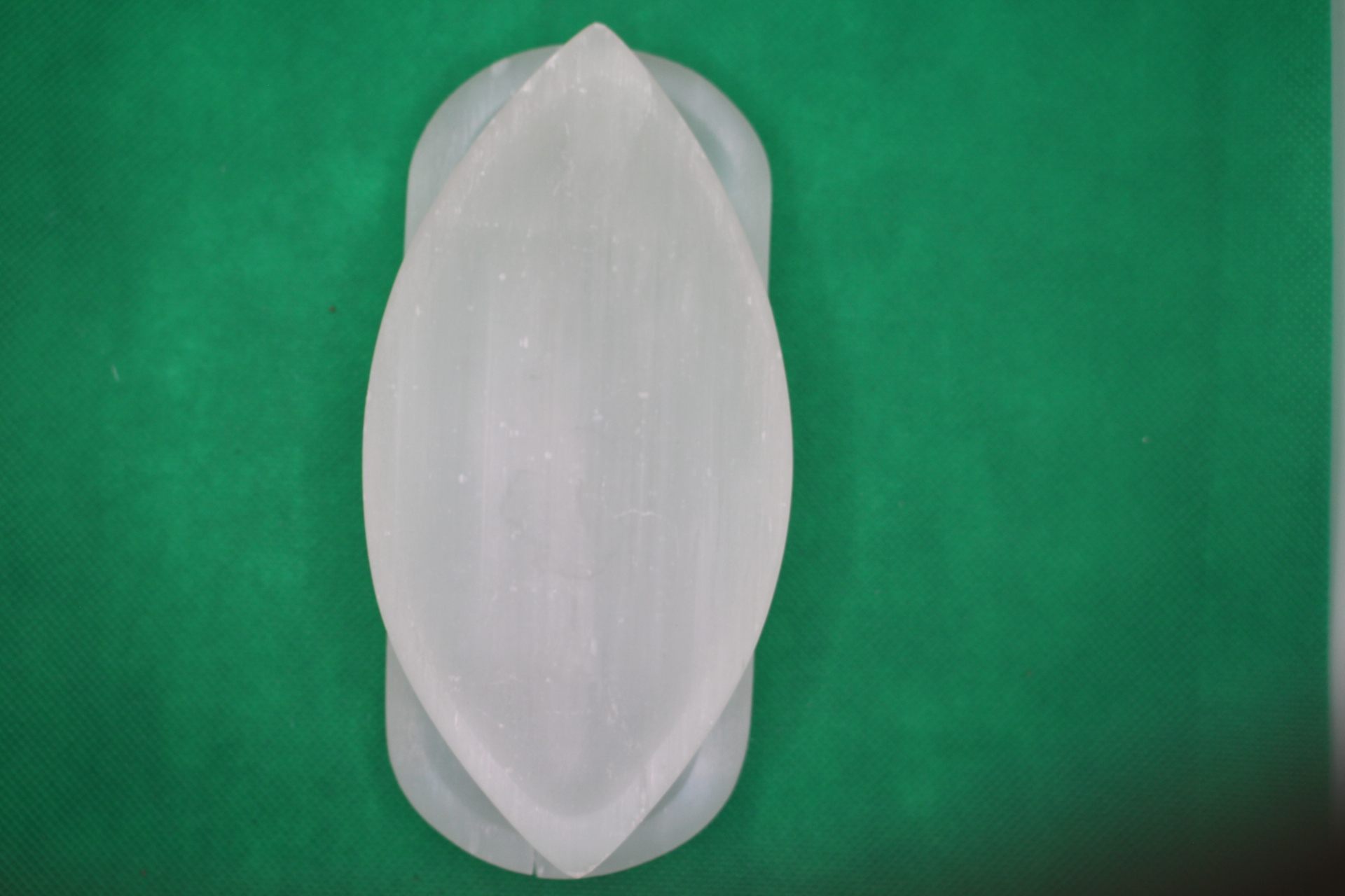 rectangular and leaf-shaped selenite plates comparison,  leaf on rectangular -- long view