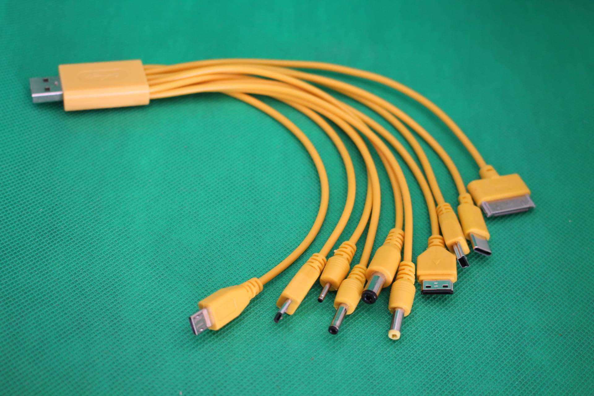 yellow 10 in 1 phone charger cable, close-up of connectors