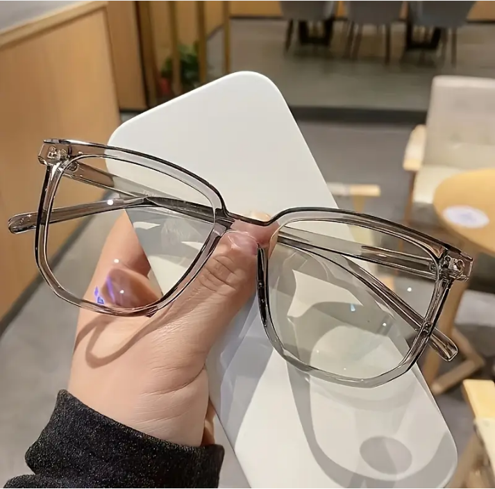 grey blue light blocking glasses from Temu, taken from promo ads from Temu