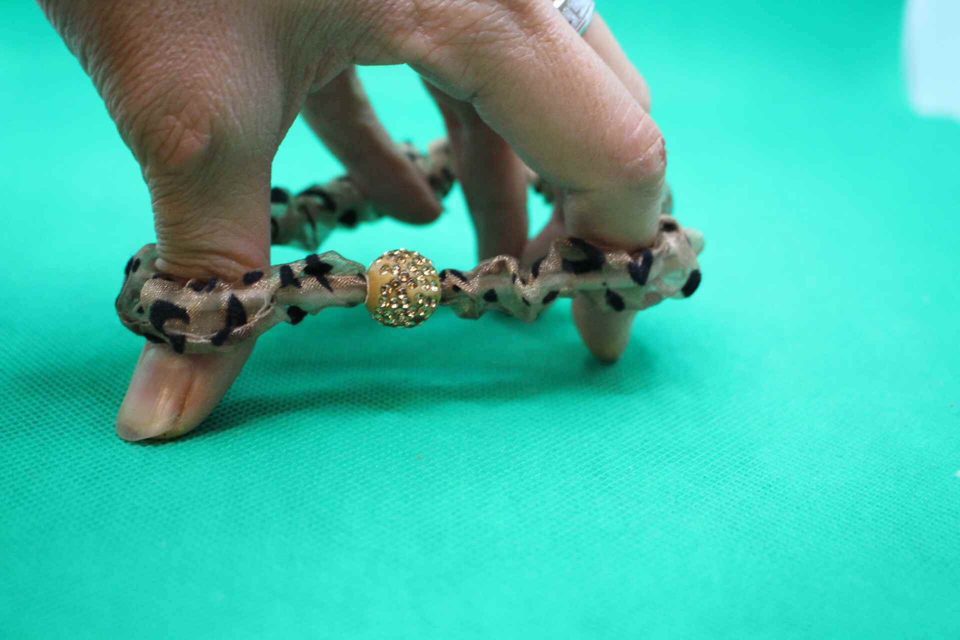 fancy hair tie stretched out