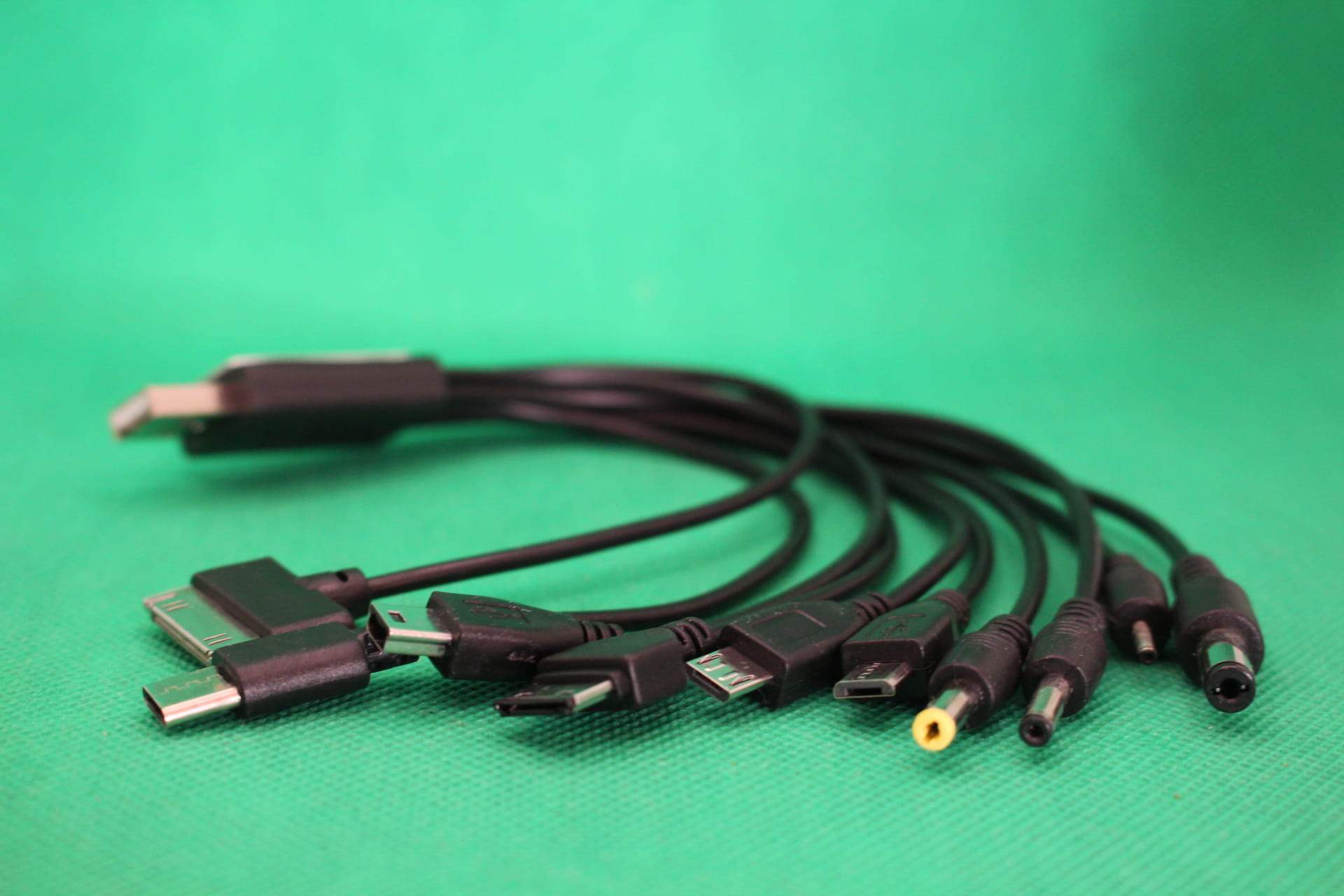 black ten in one multi charger cable for multiple devices, close-up of connectors