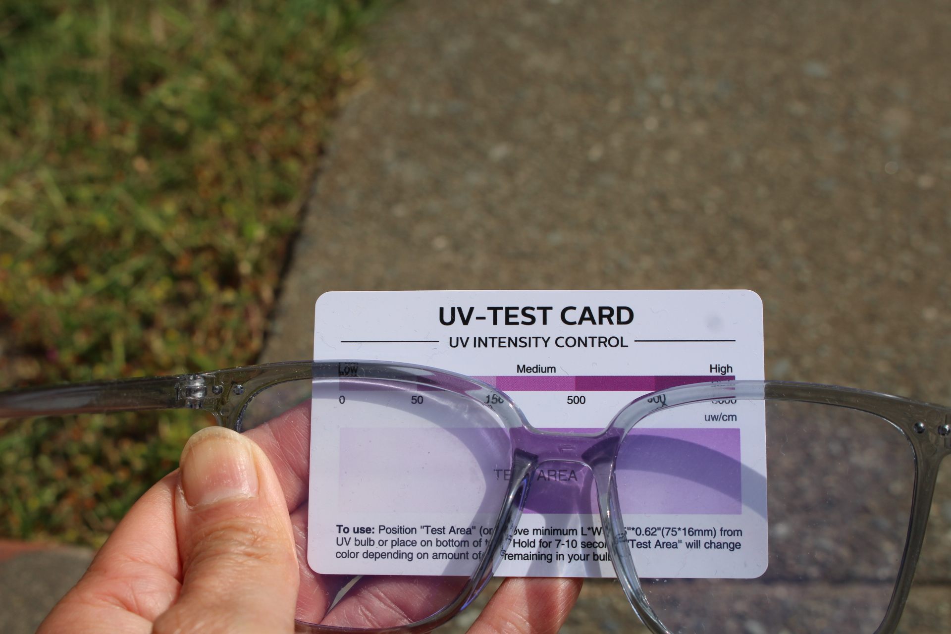 UV-light-blocking test, showing one UV light tester filtered partly by blue-light-blocking glasses
