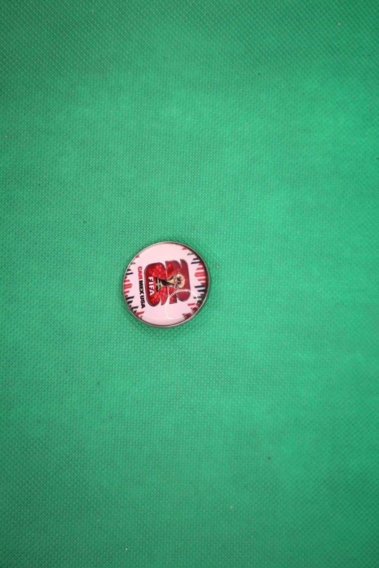 FIFA World Cup 2026 brooch pin, official logo, side view