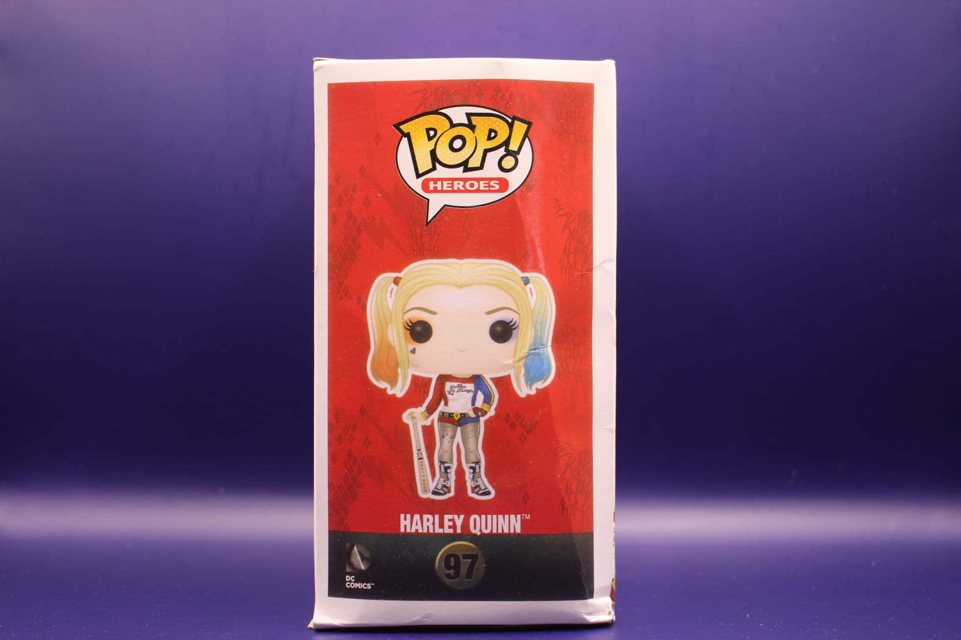 Harley Quinn Funko in box, side view