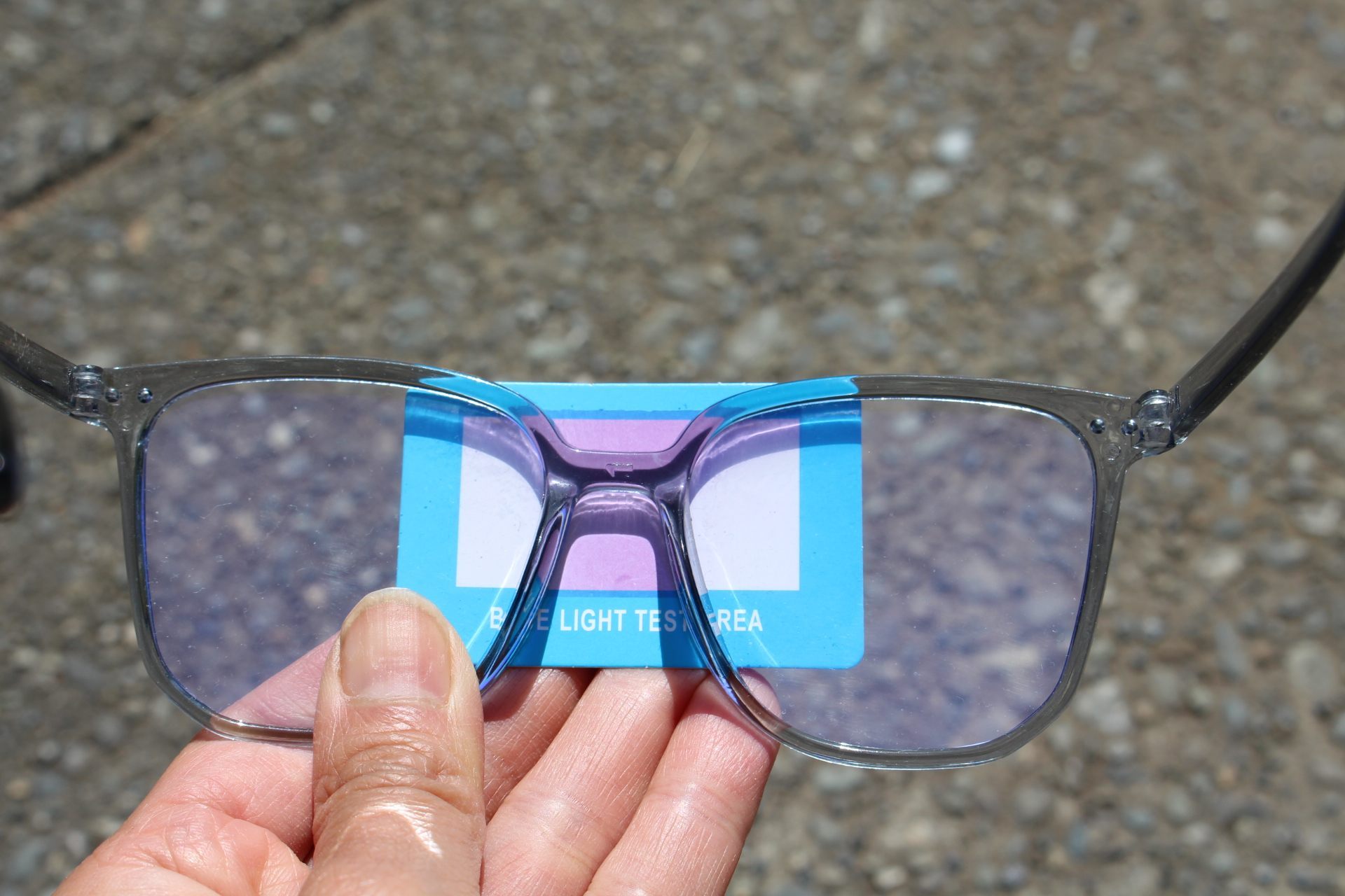 blue-light-blocking test, showing blue light tester filtered partly by blue-light-blocking glasses