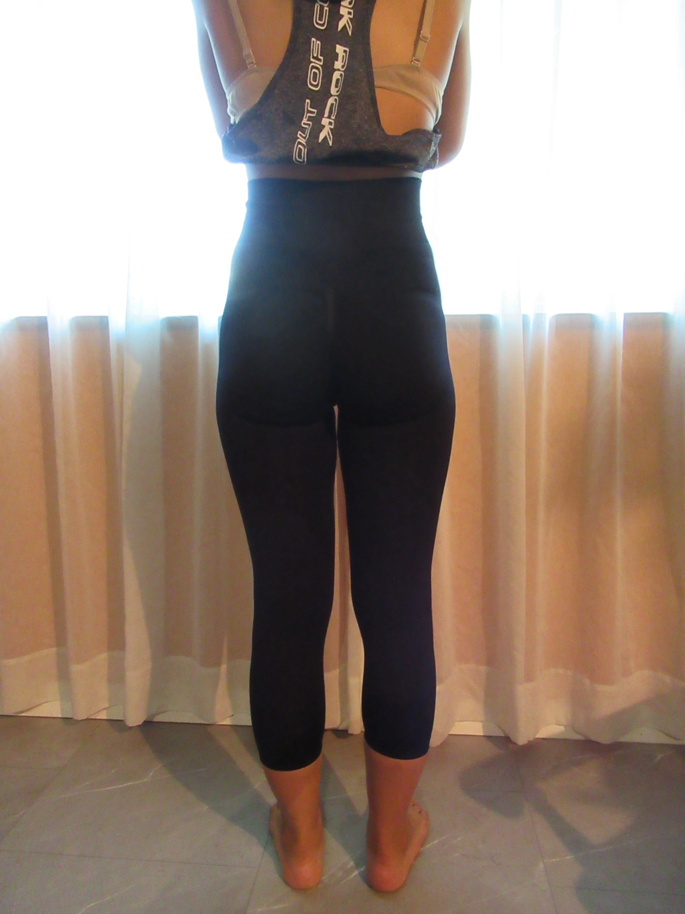 black butt-lifting pants from 3-colour butt-lifting legging set from Temu -- back view