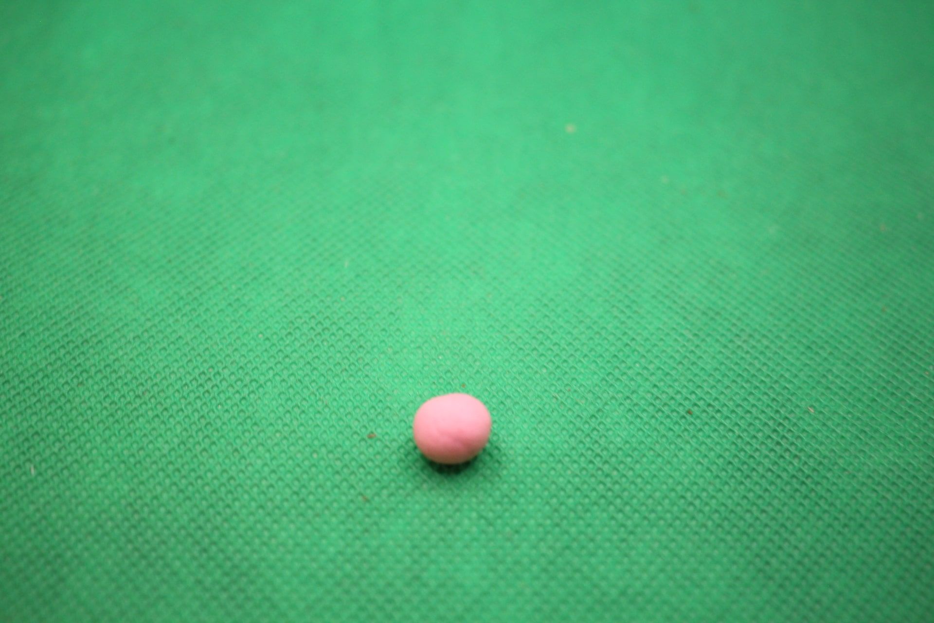 sticky tack putty rolled into a ball