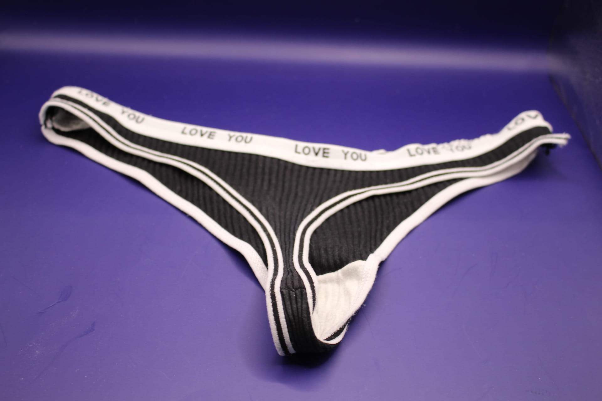 black cotton LOVE YOU panties for women from Temu, back view