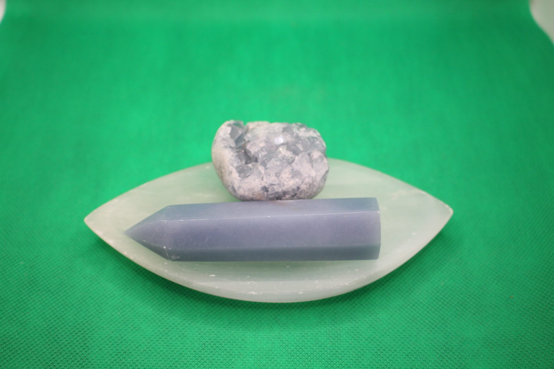 leaf-shaped selenite plate with big angelite and celestialite crystals on it