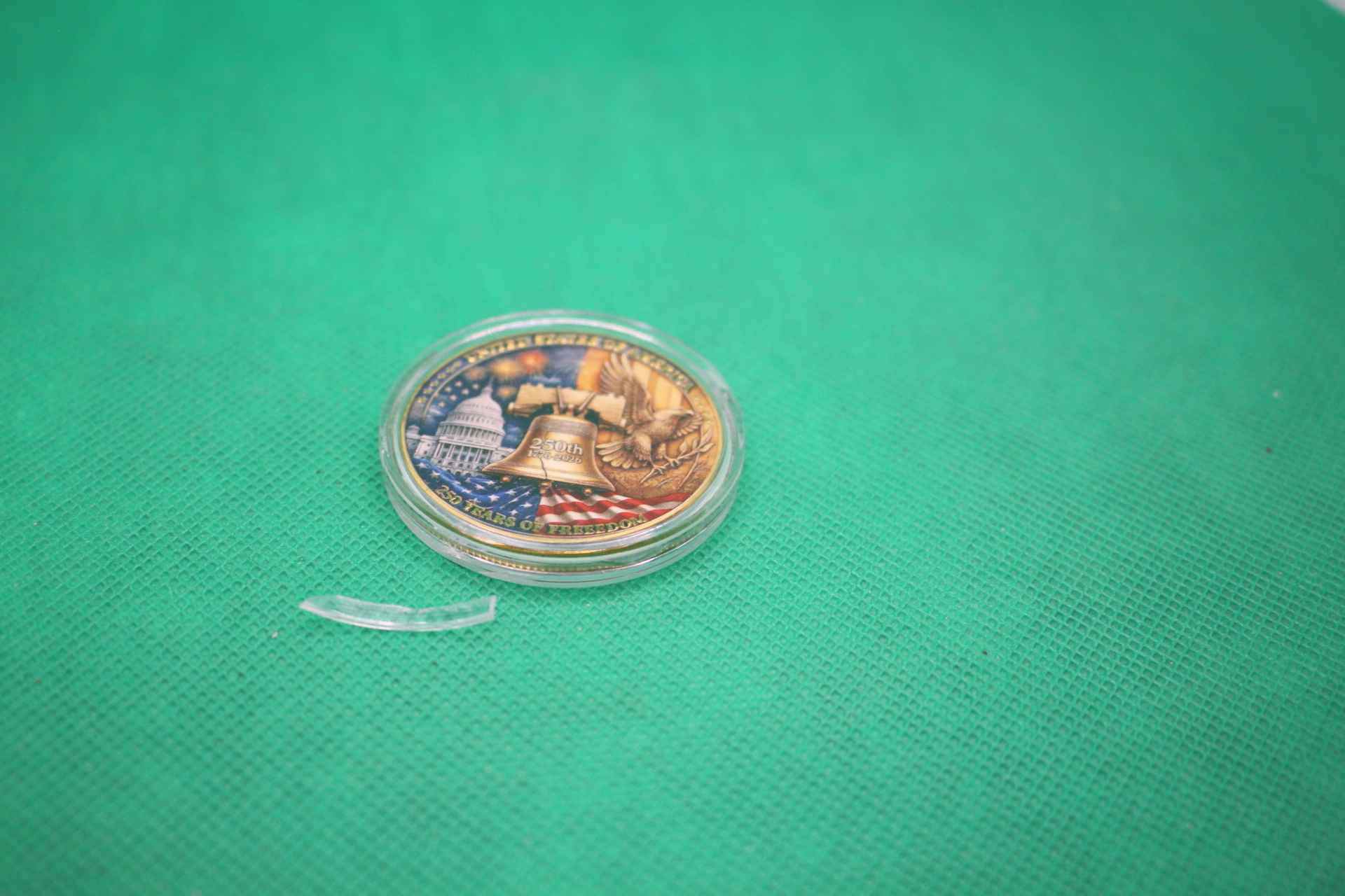 USA 250 year anniversary coin design with broken casing