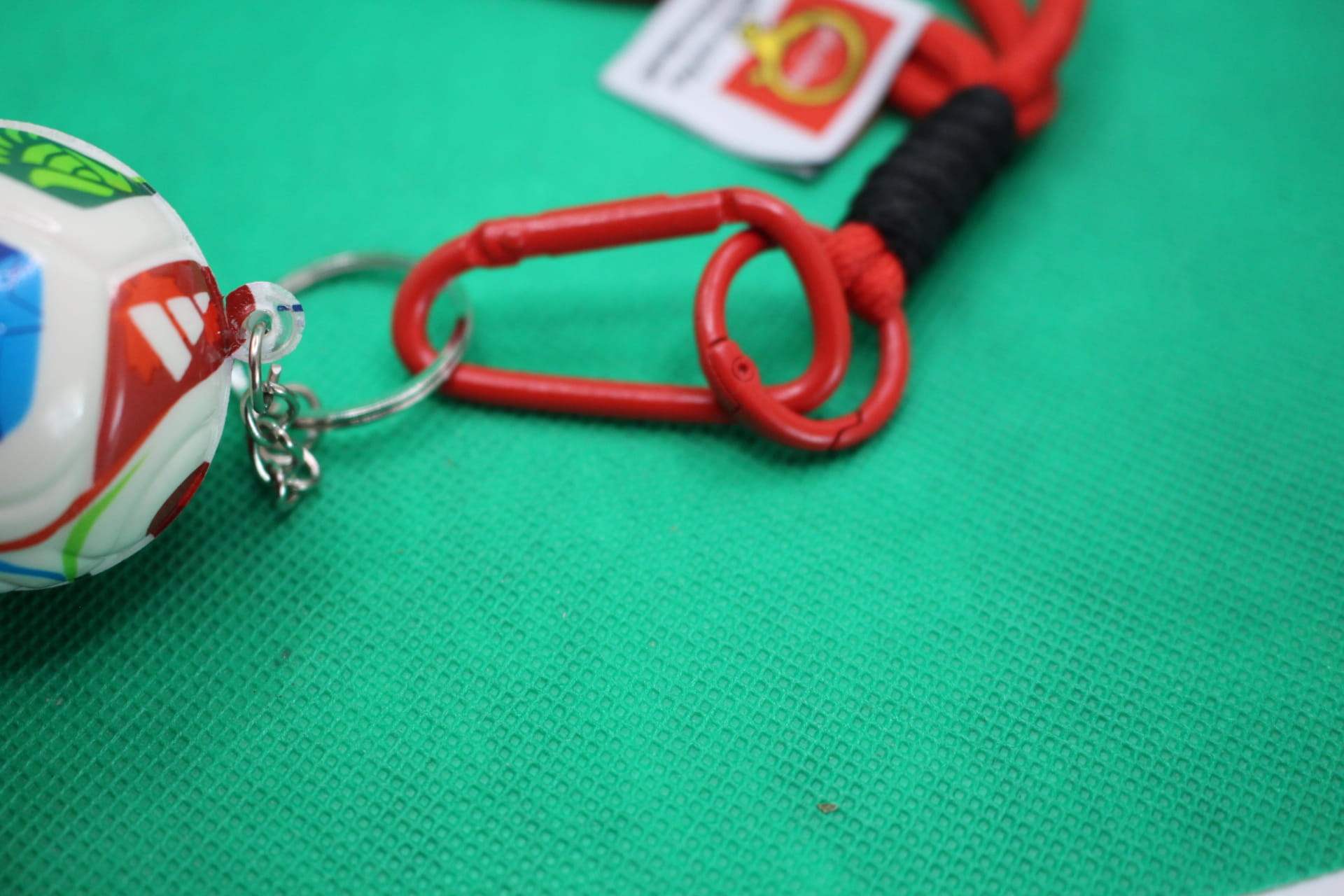 FIFA World Cup 2026 ball keychain, red carabiner focus