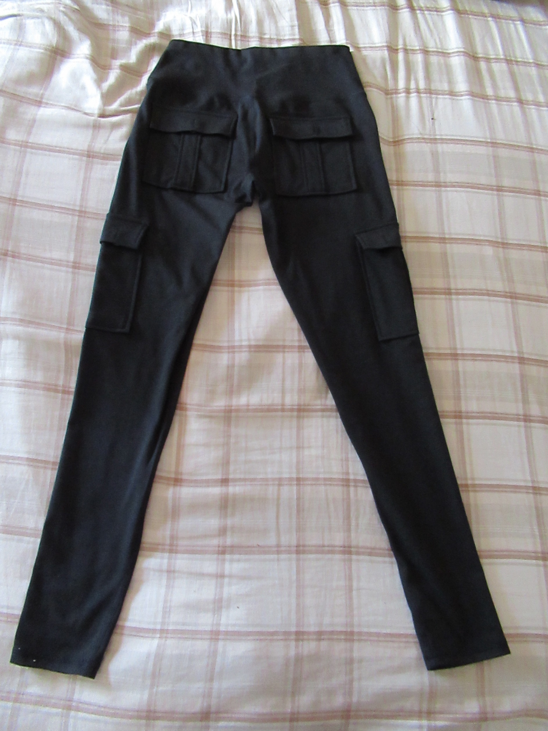 cargo butt-lifting pants with pockets -- black, back view, cargo-style butt-lifting pants alone