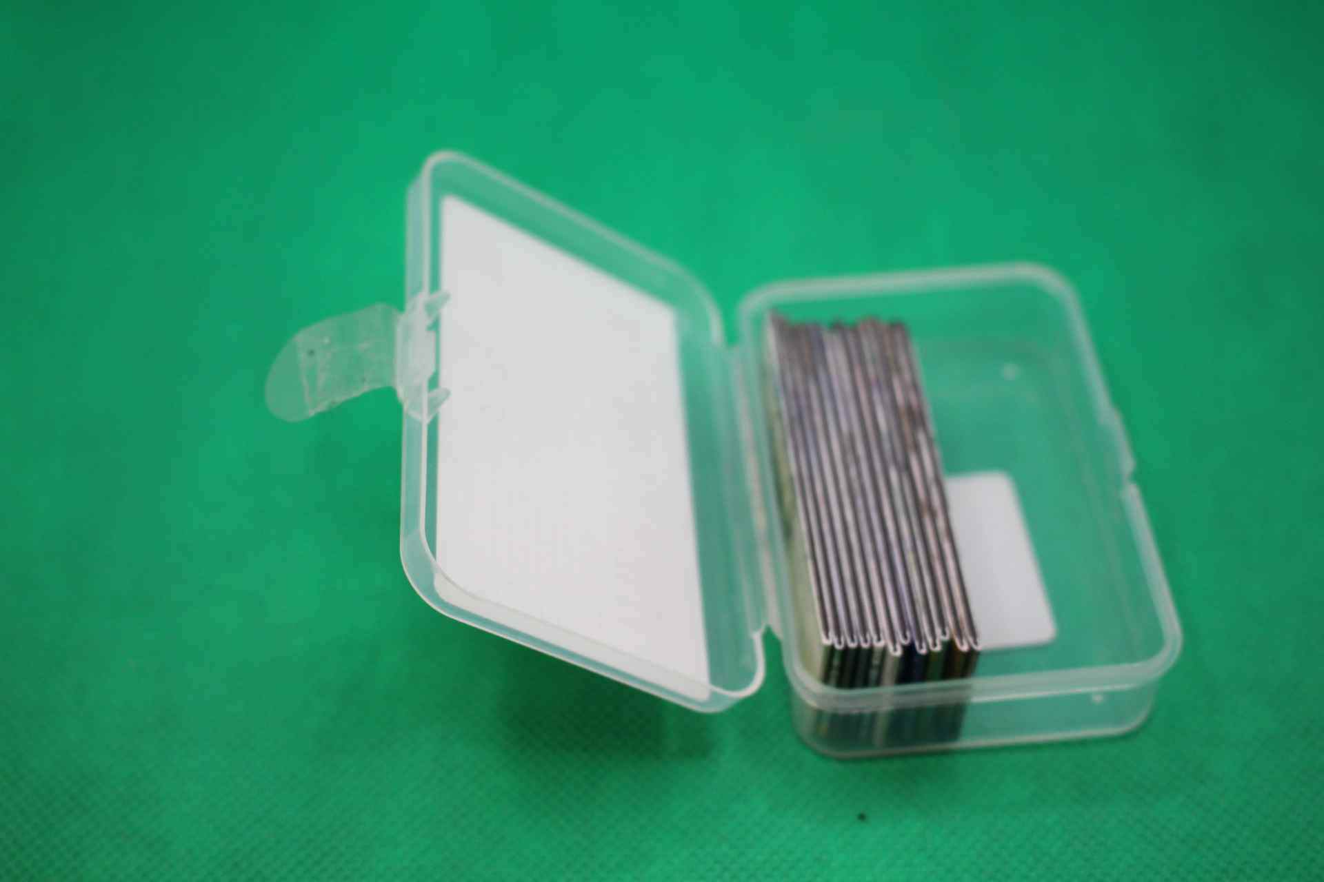 12 magnetic bookmarks in plastic box package