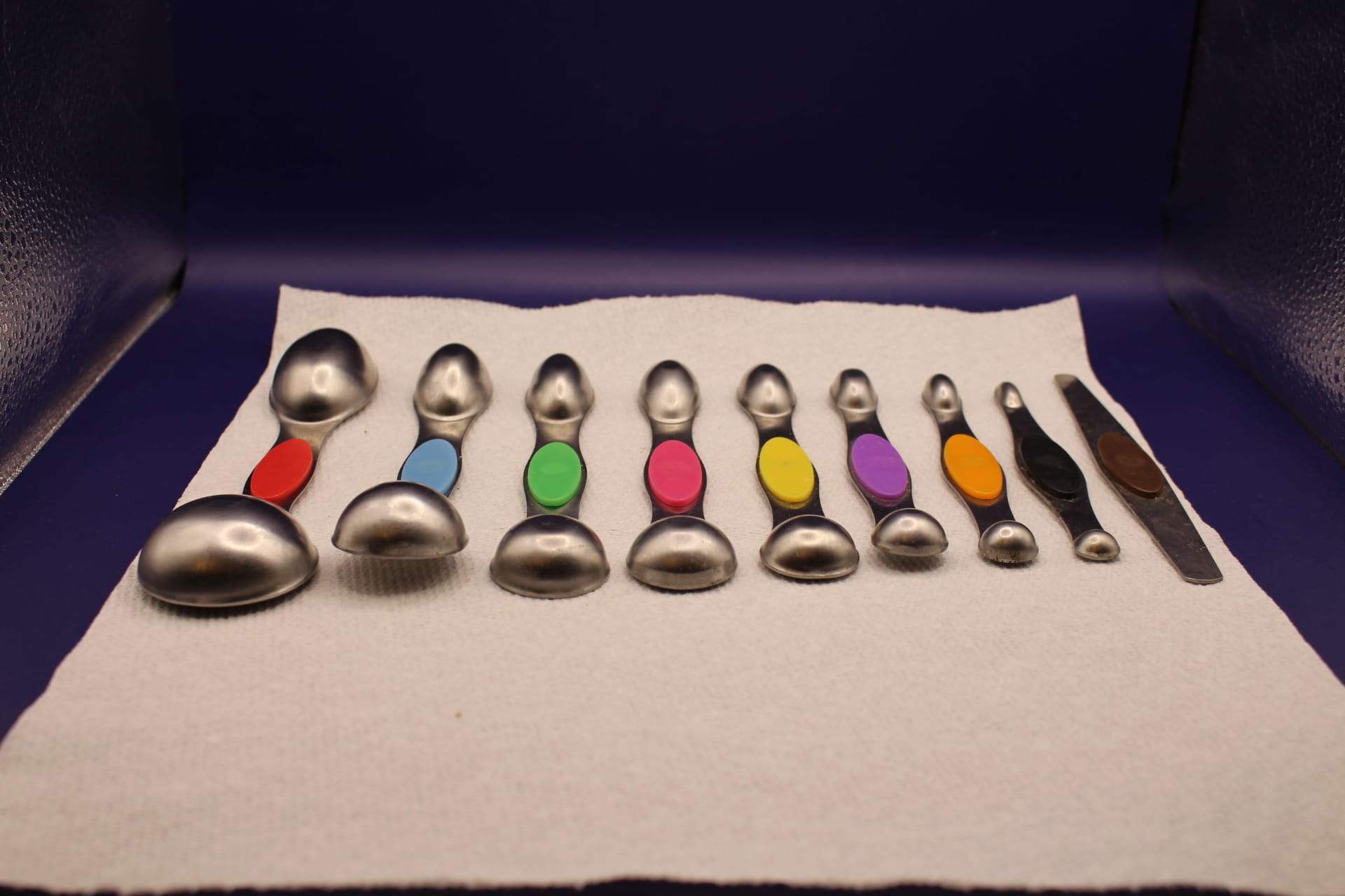 stainless steel measuring spoons magnetic set, scoop side down