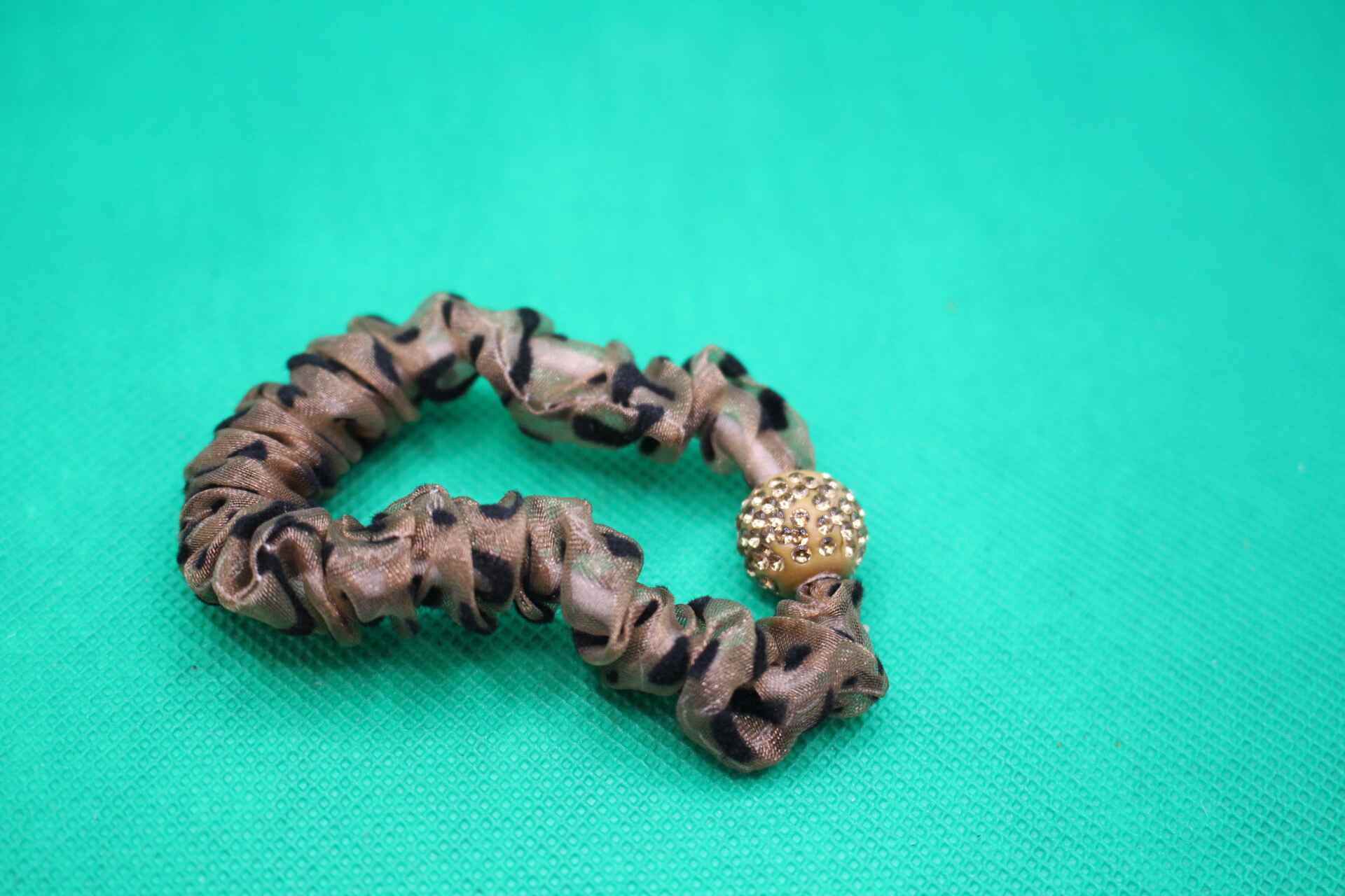 fancy hair tie overhead shot