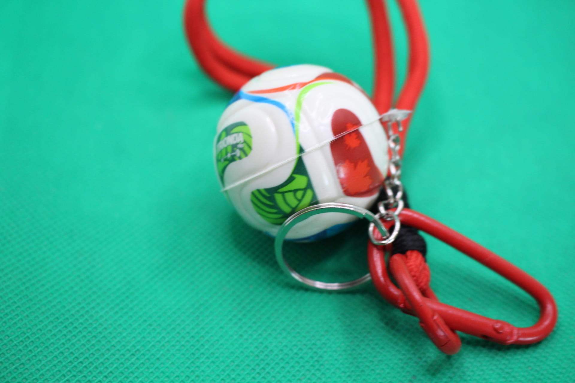 FIFA World Cup 2026 ball keychain, soccer ball focus. unaligned sections