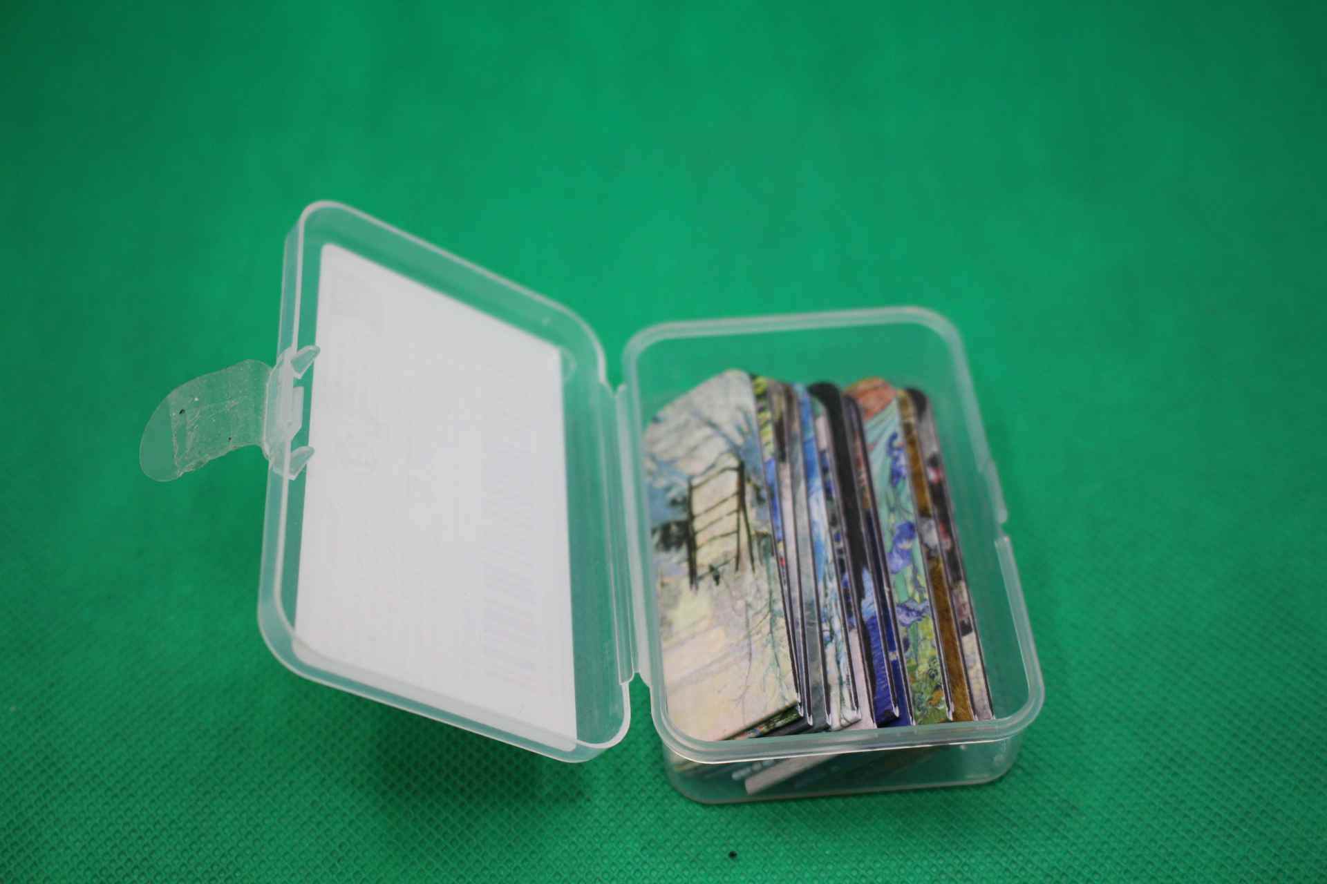 12 magnetic bookmarks in plastic box package