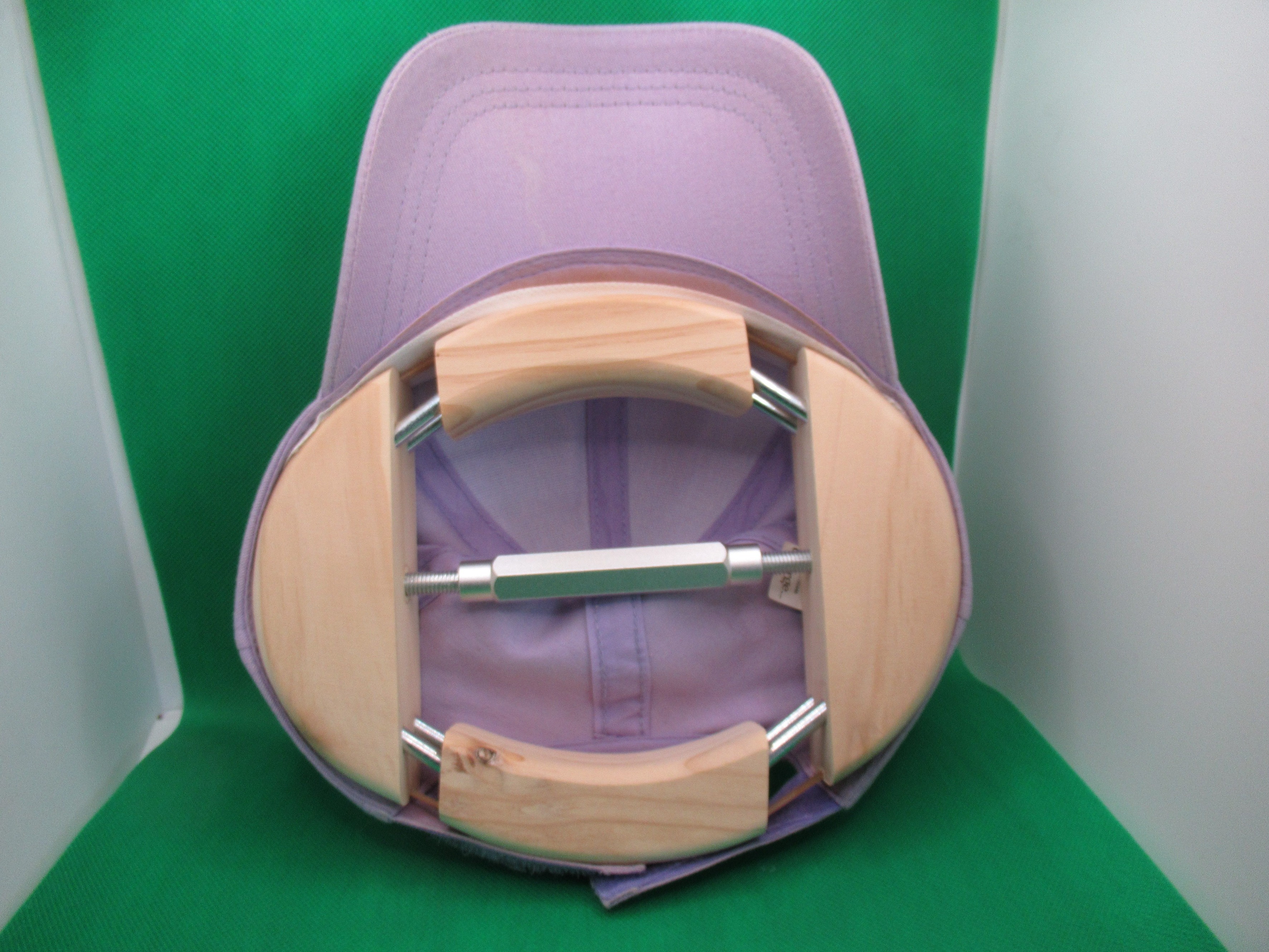 hat stretcher changed in orientation to stretch width of hat