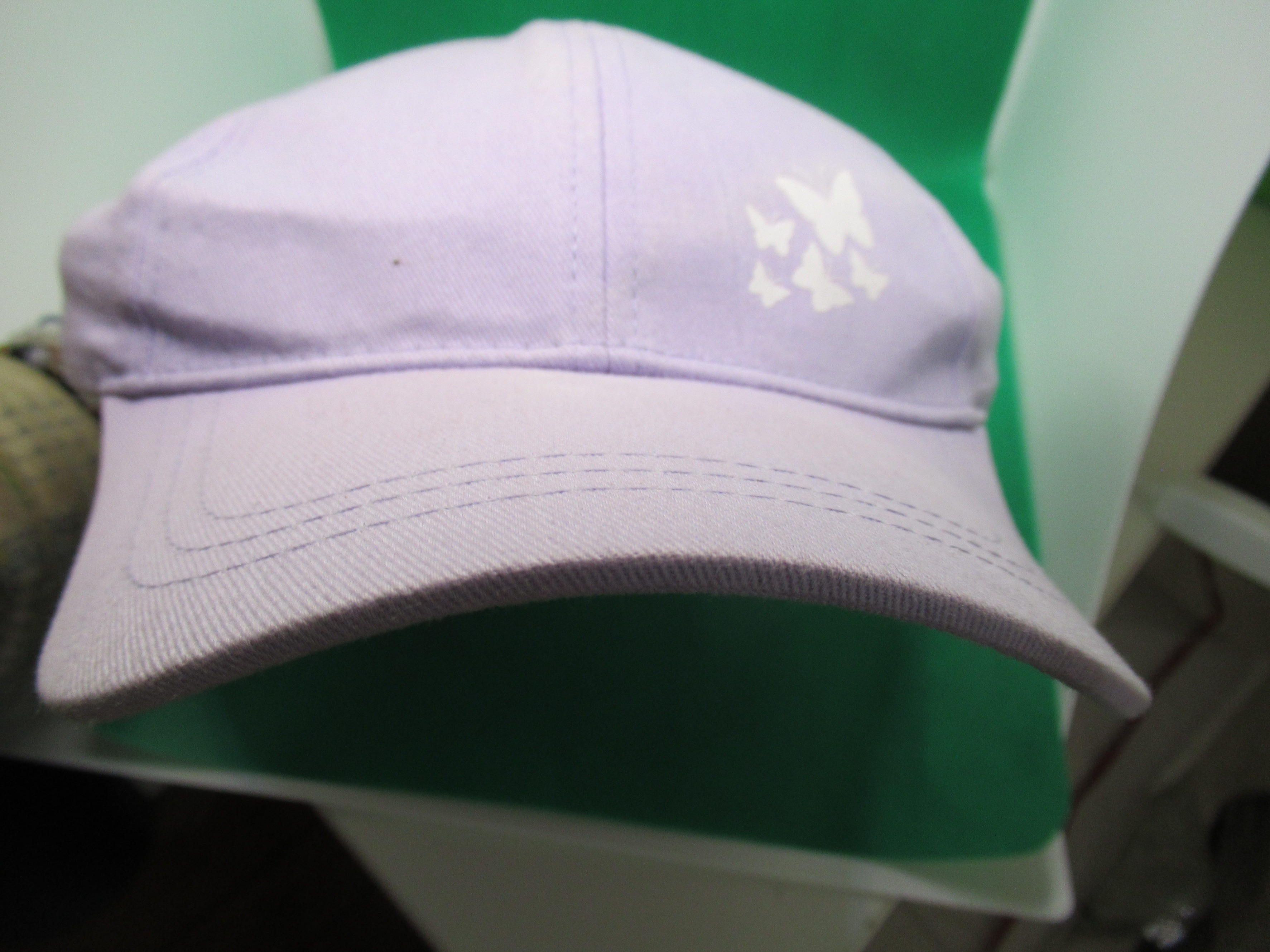 baseball cap dome deformed by hat stretcher