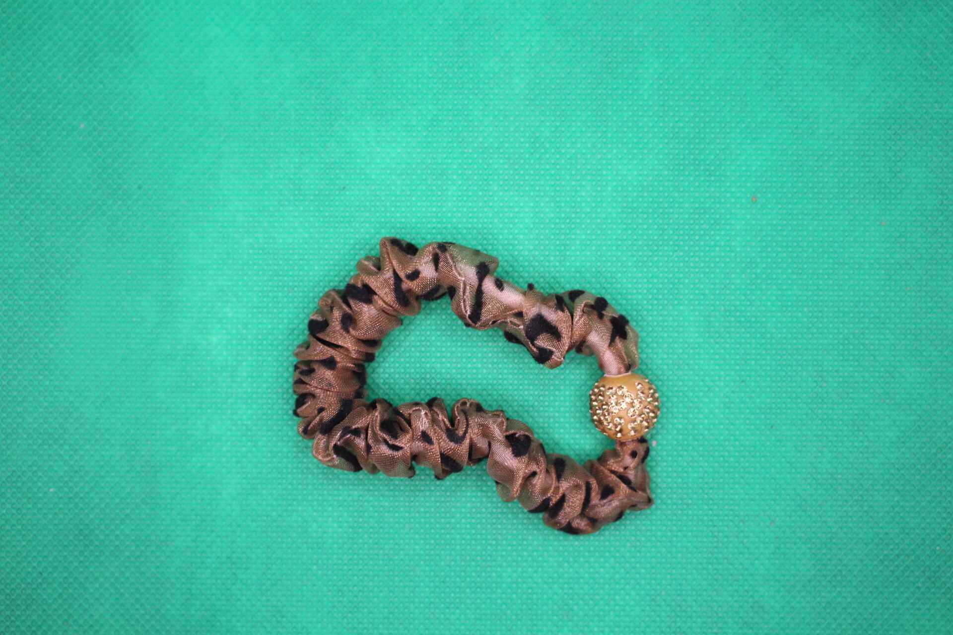 fancy hair tie overhead shot