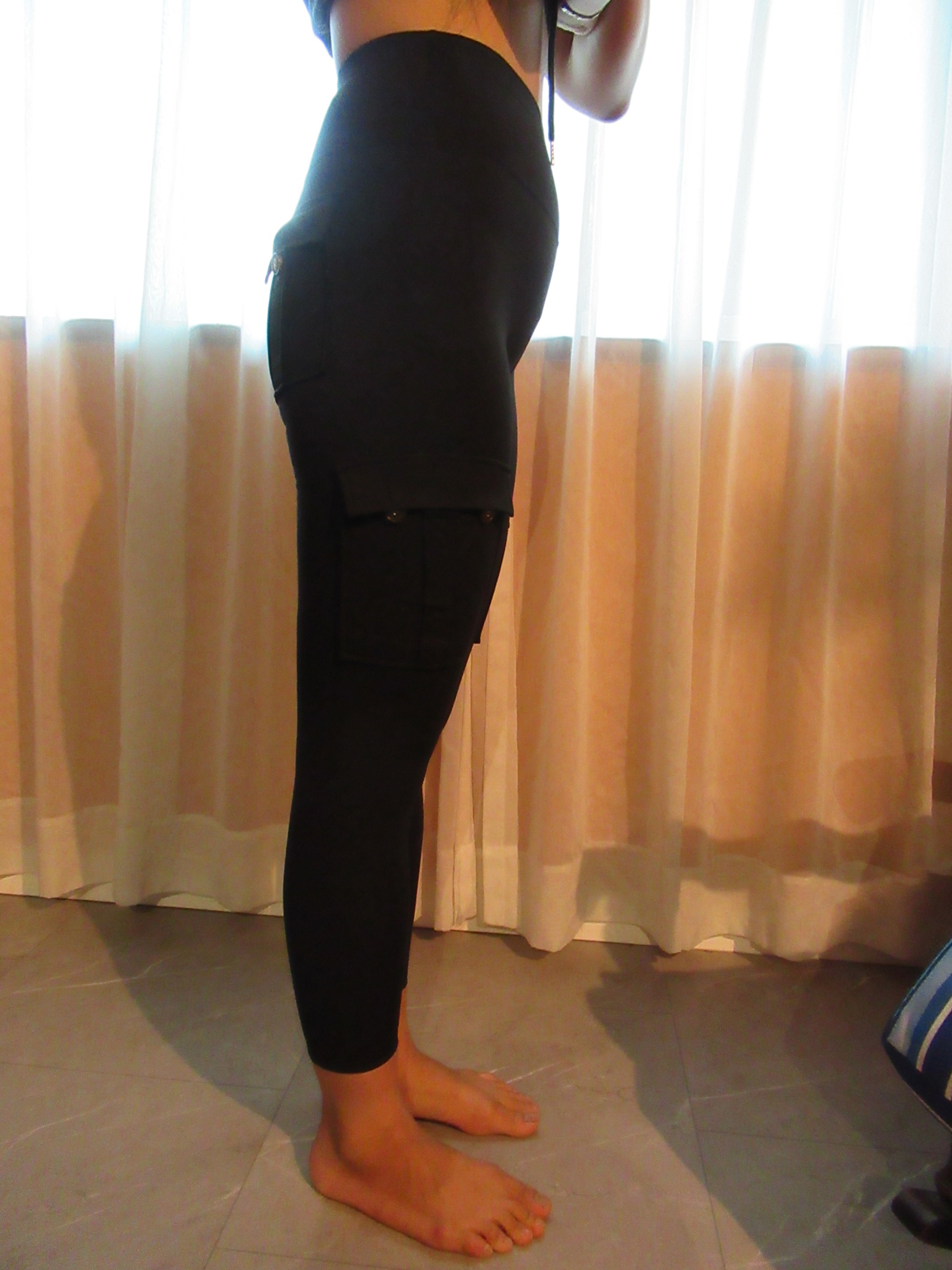 model cargo butt-lifting pants with pockets from Temu -- right side view
