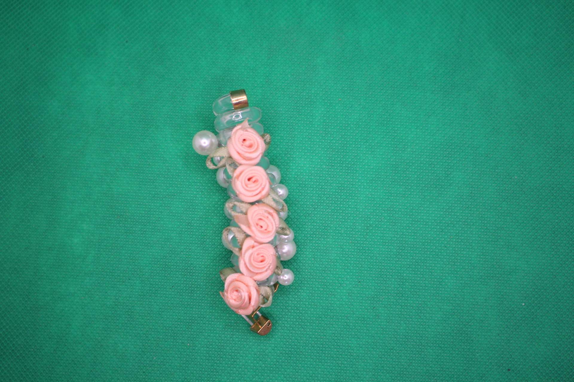 rose telephone cord hair tie top view -- peach color