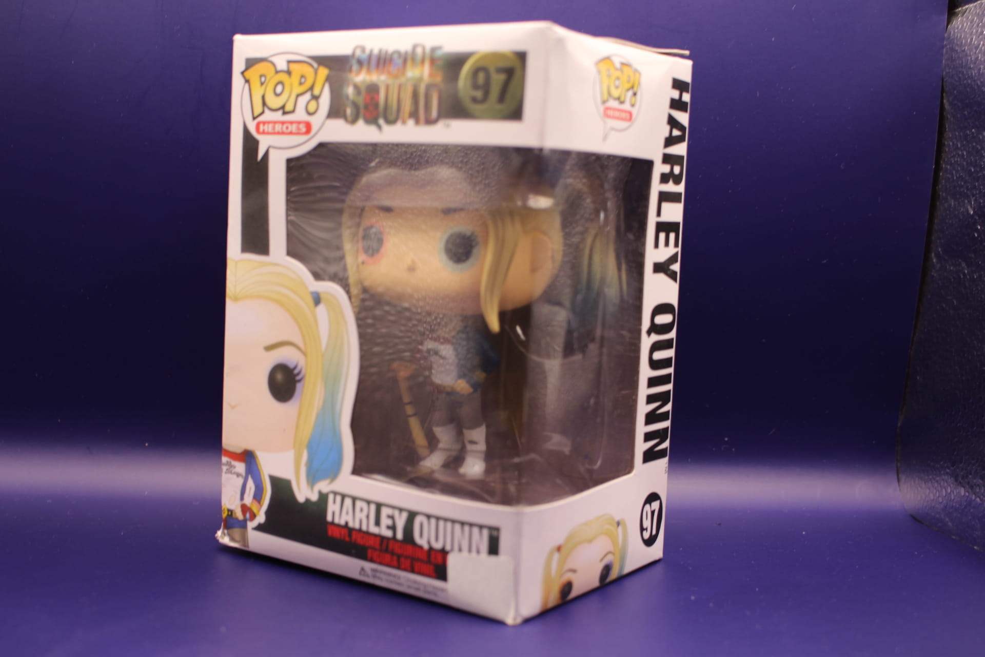 Harley Quinn Funko in box, diagonal front view facing left