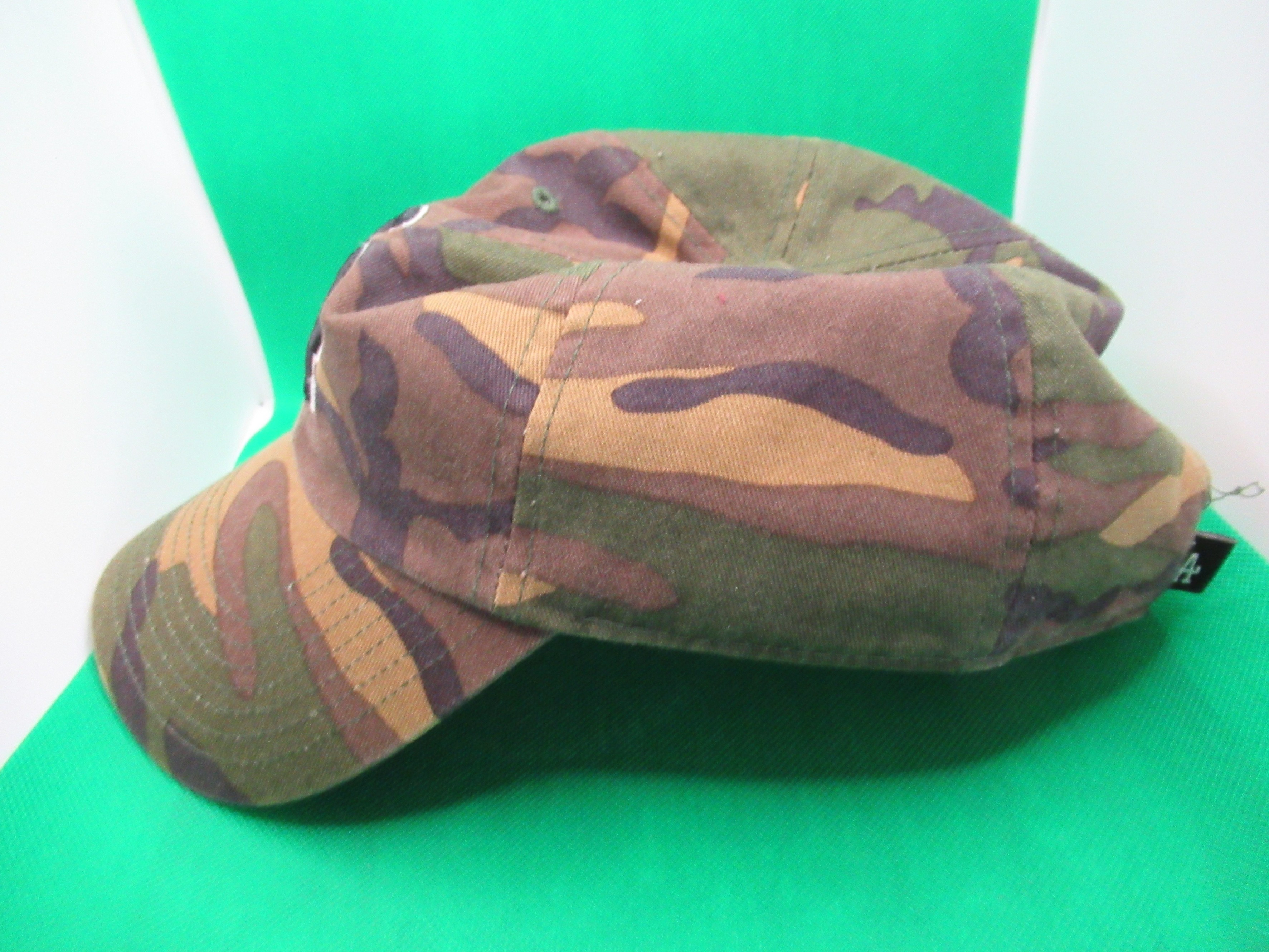 baseball cap after being stretched out by hat stretcher