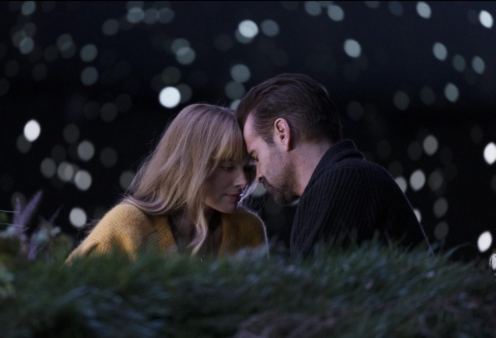 A Big Bold Beautiful Journey David and Sarah sitting together under the stars