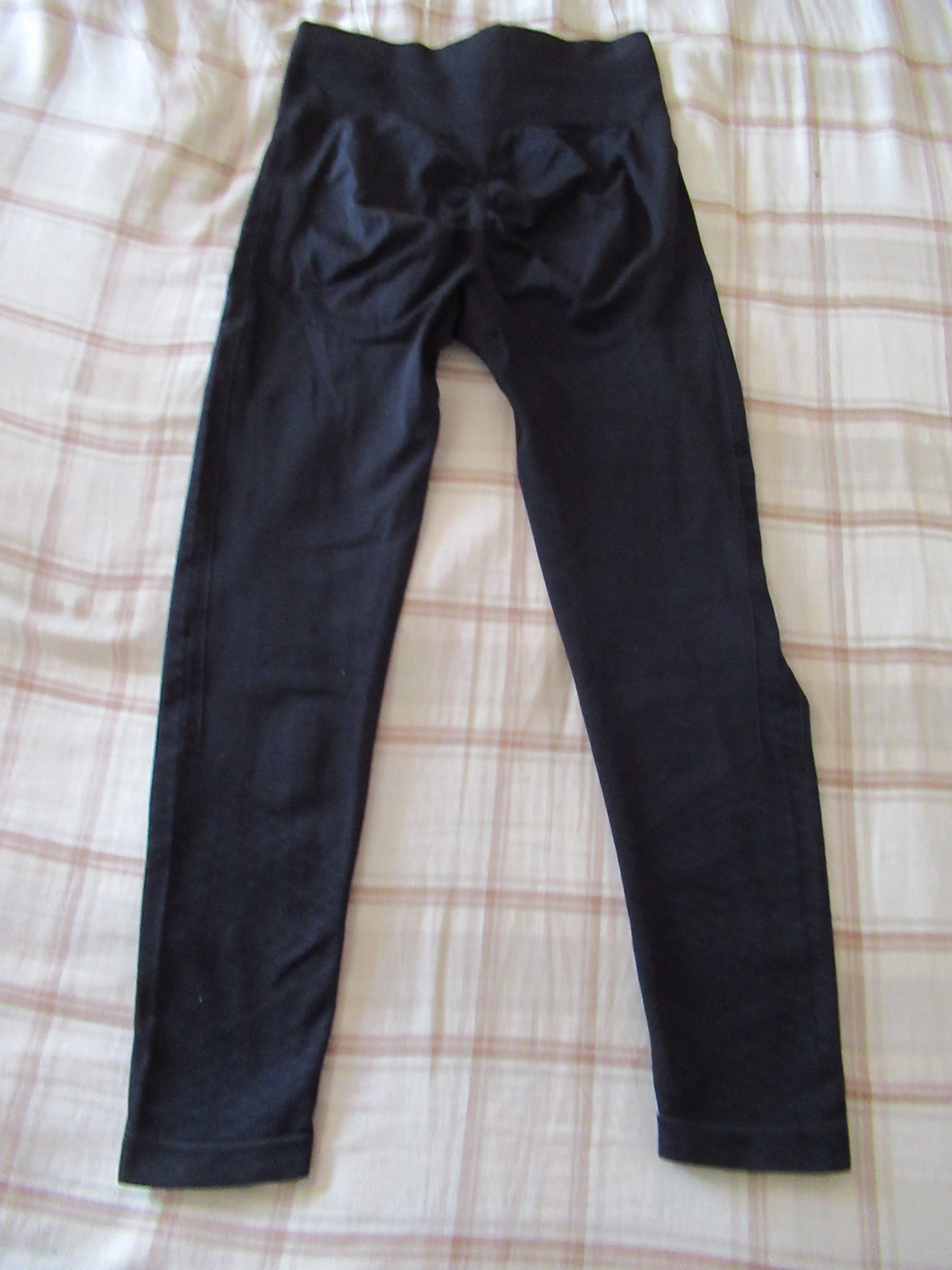 butt-lifting pants specifically designed to lift the butt, set of three -- black, back view, butt-lifter pants alone