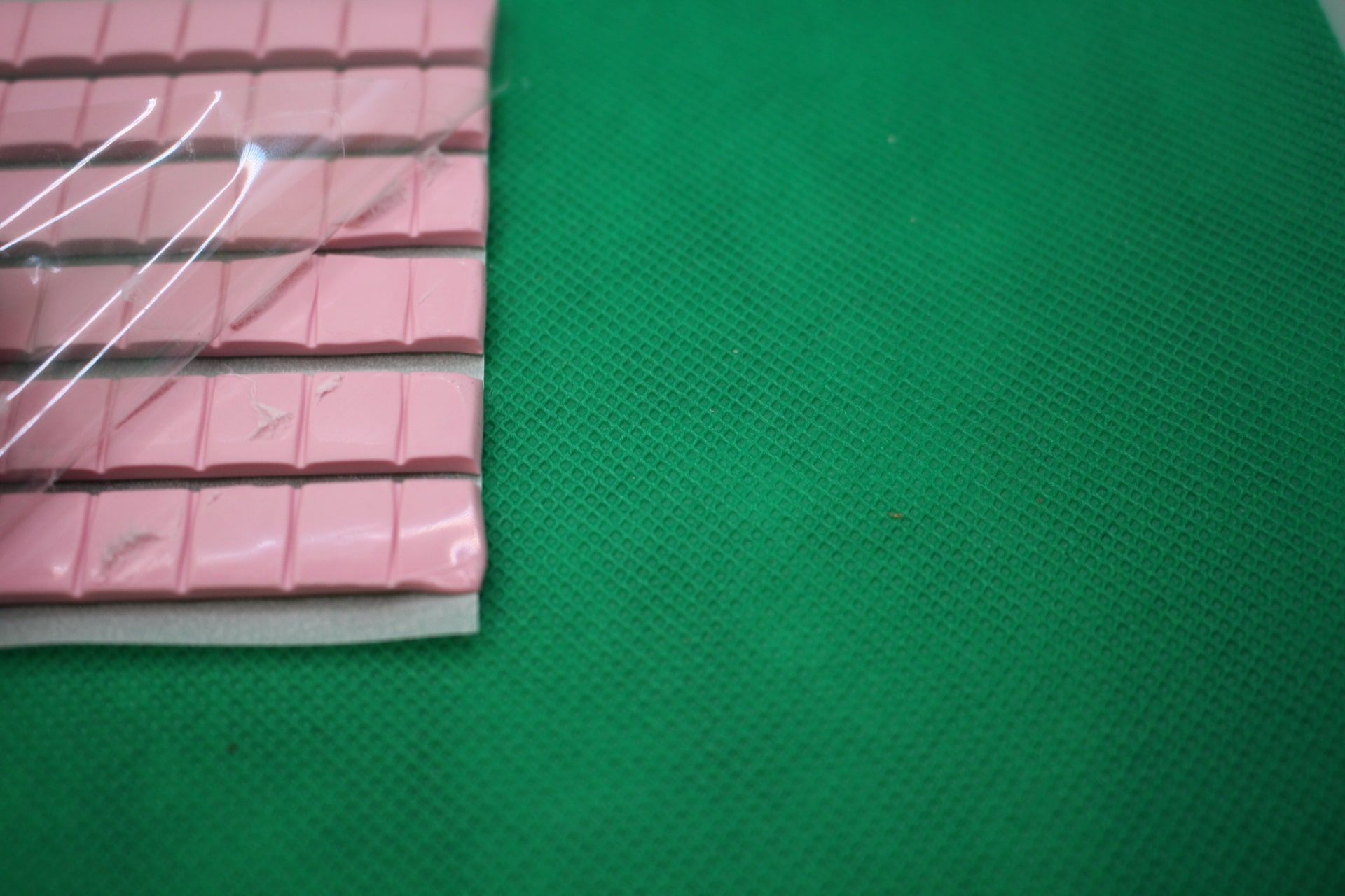 sticky tacky putty with protective film lifted off